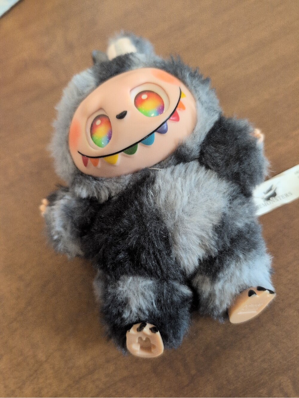 The Monsters Labubu Pop Mart Rainbow eyes and teeth.